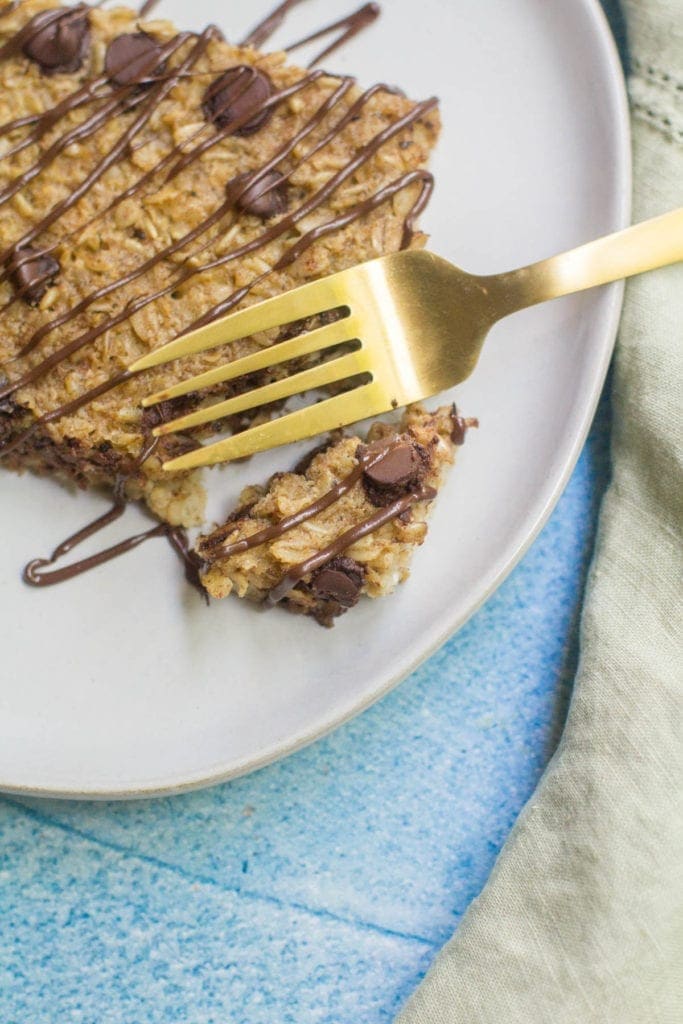 Healthy Chocolate Coffee Oatmeal with a bite being taken out of it with a fork. 