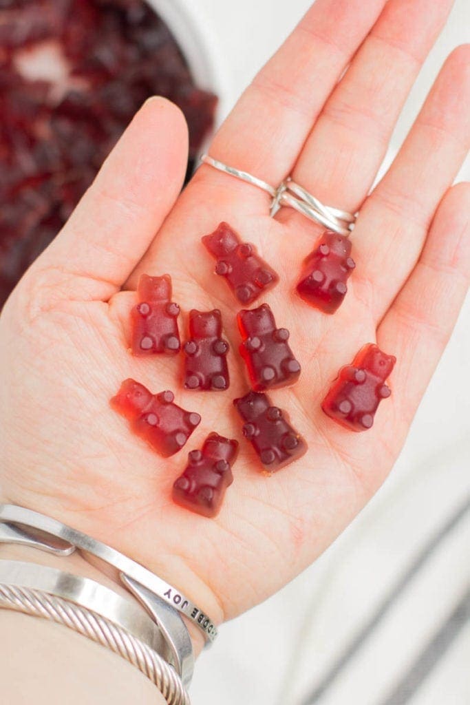 Easy to make, Healthy Gummy Sweets in the palm of someones hand.