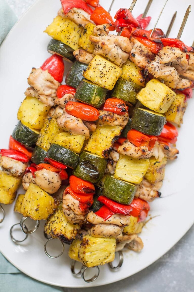 Pineapple Chicken Kabobs fresh off the grill on a white platter