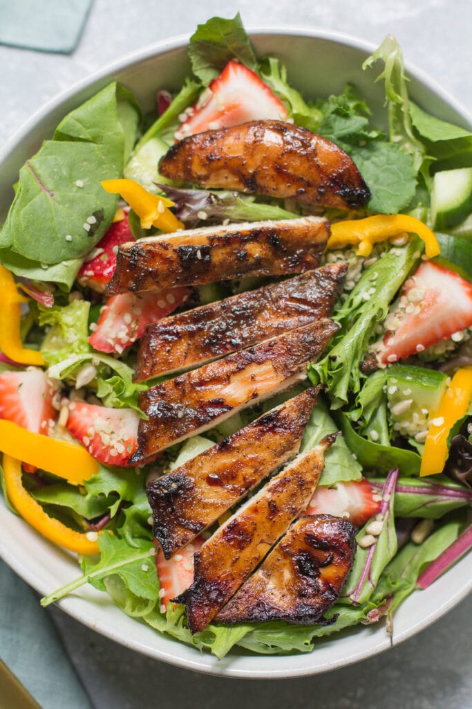 paleo Balsamic grilled chicken on a salad.
