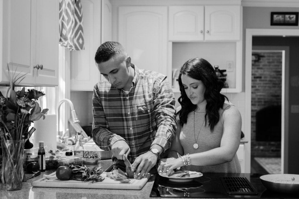 the clean eating couple cooking in the kitchen