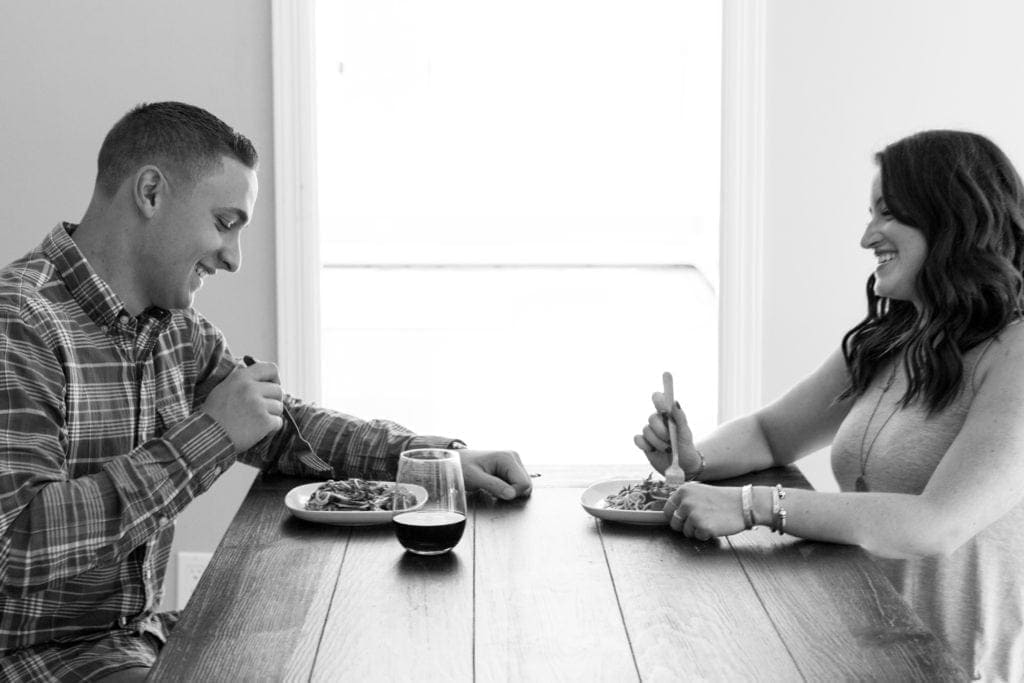 A Day in the Life of a Food Blogger- a couple eating at a table