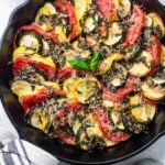 An overheat shot of Healthy Zucchini Tomato Bake in a cast iron skillet