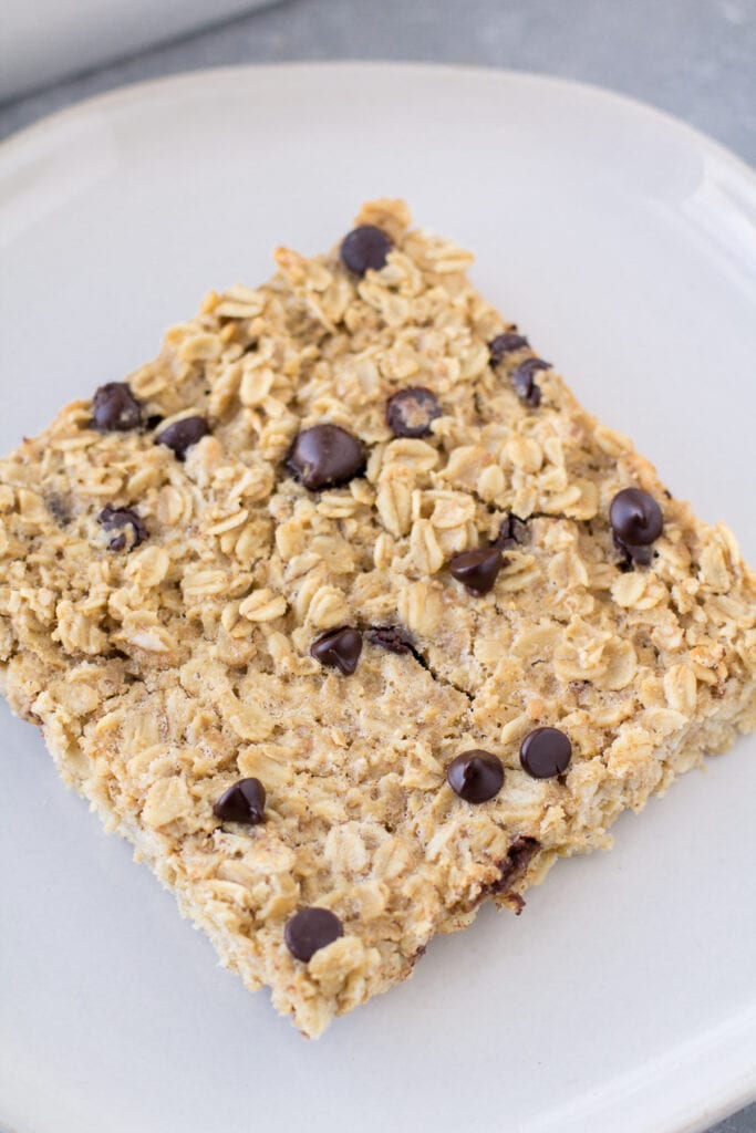 A slice of chocolate peanut butter oatmeal on a white plate