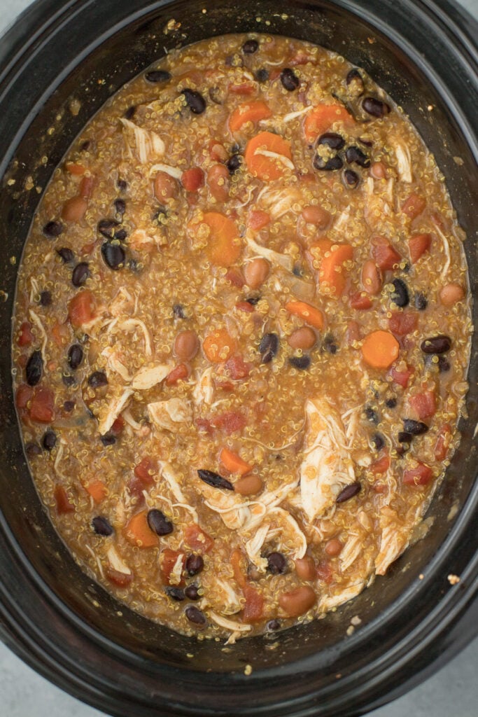 An overhead image of Crockpot Chicken Quinoa Soup finished cooking.