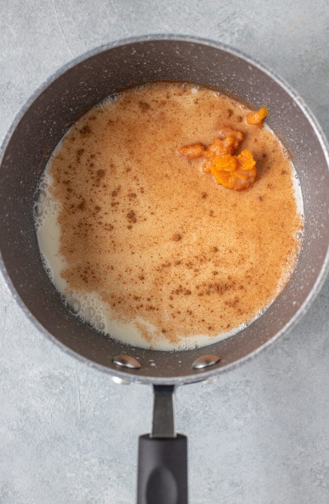 Healthy Pumpkin Spice Latte in a grey pan on a grey background