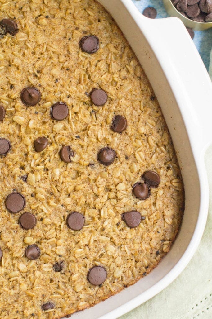 Healthy Chocolate Coffee Oatmeal in a white baking dish fresh out of the oven.