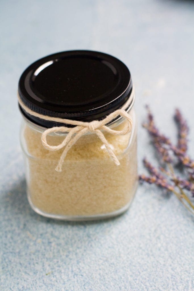 DIY Sugar Scrub with a black top.