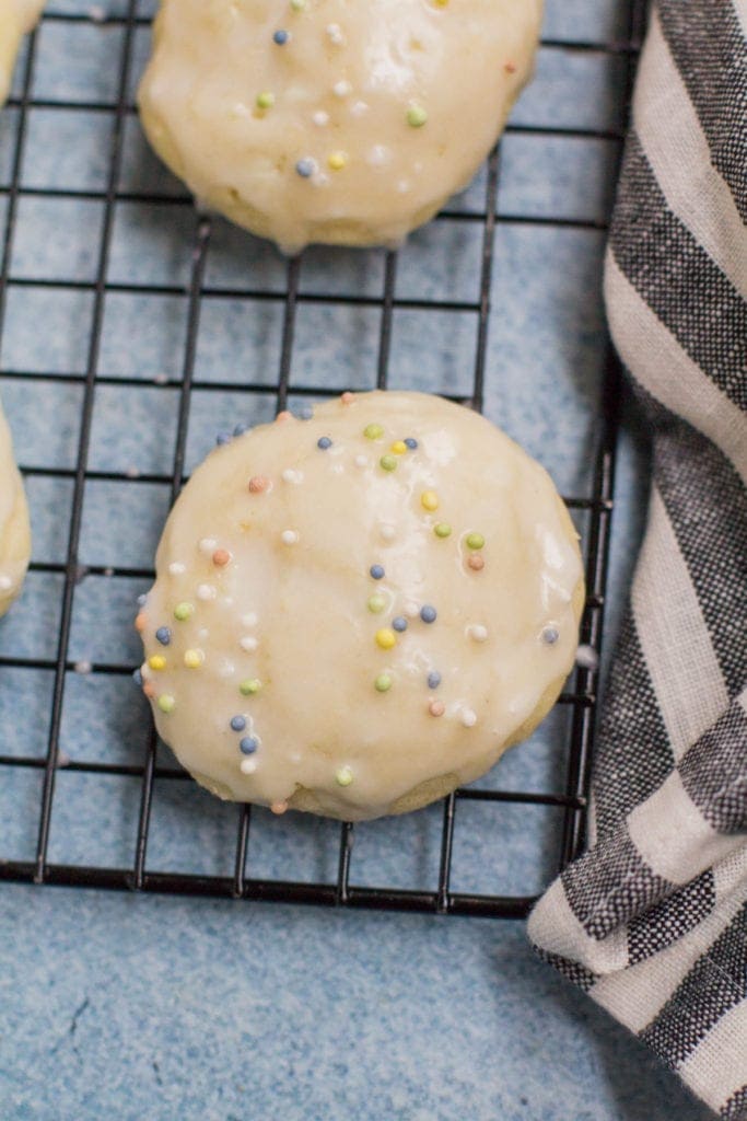 Healthy Anginetti Cookies dipped in a powdered sugar glaze and sprinkled