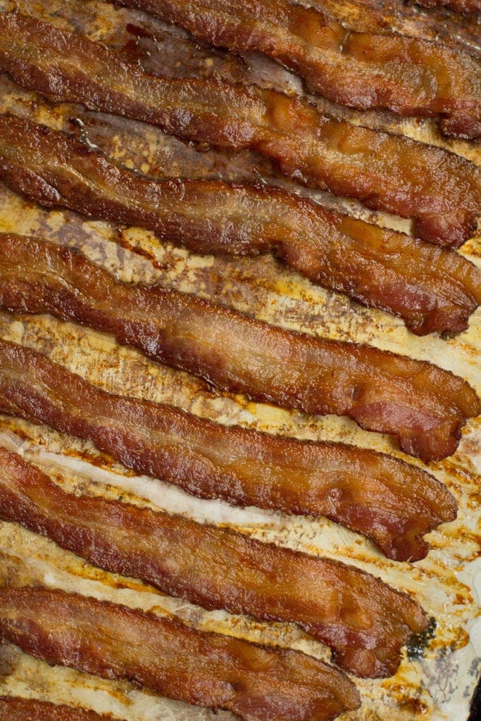 Crispy bacon on a baking sheet.