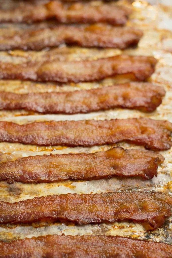 Crispy bacon on a baking sheet.