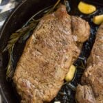 A Cast Iron Steak cooked perfectly in a skillet