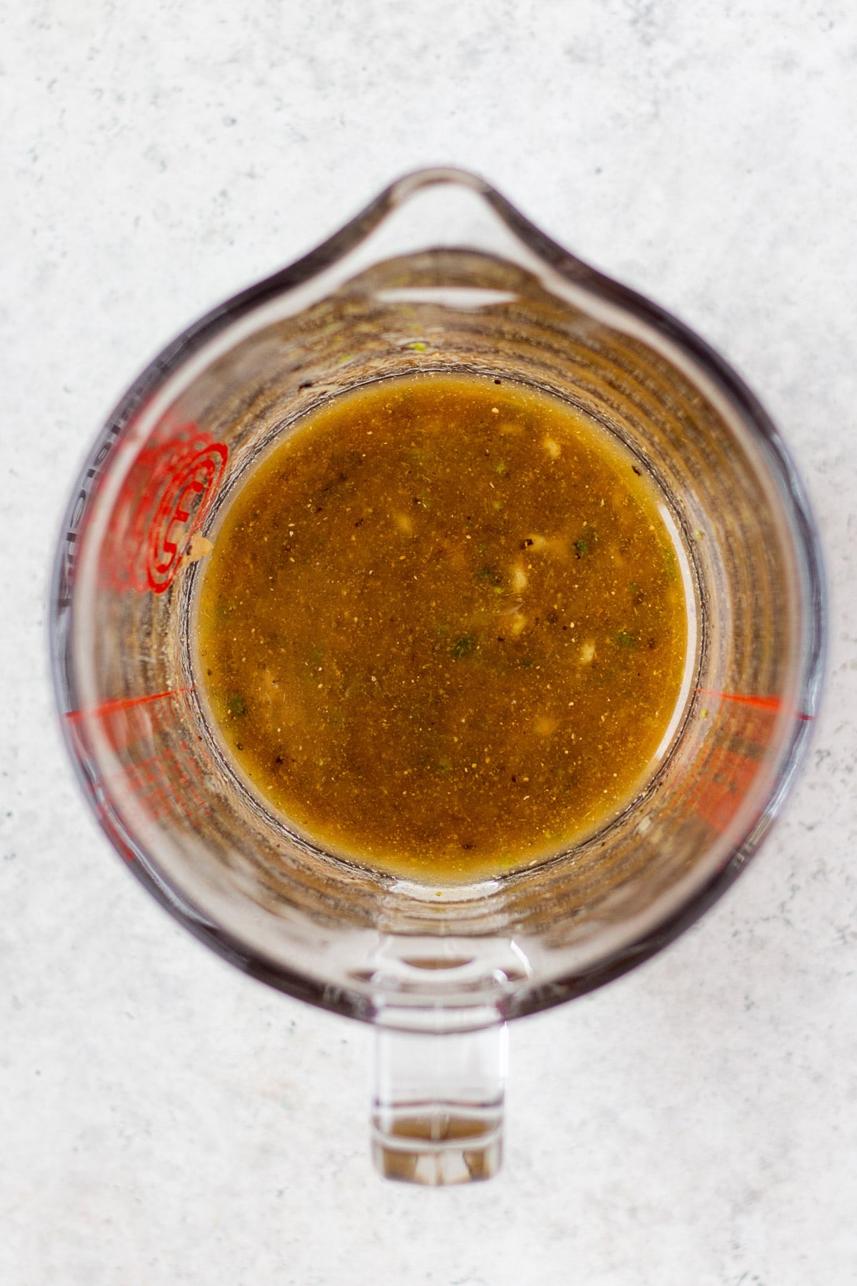 marinade for healthy sesame chicken after being whisked in a pyrex cup