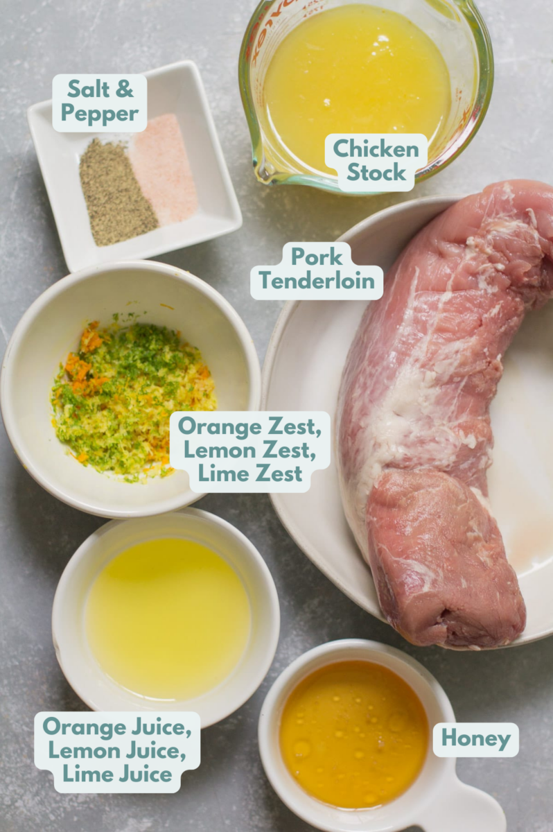 ingredients for citrus grilled pork tenderloin laid out on a grey background