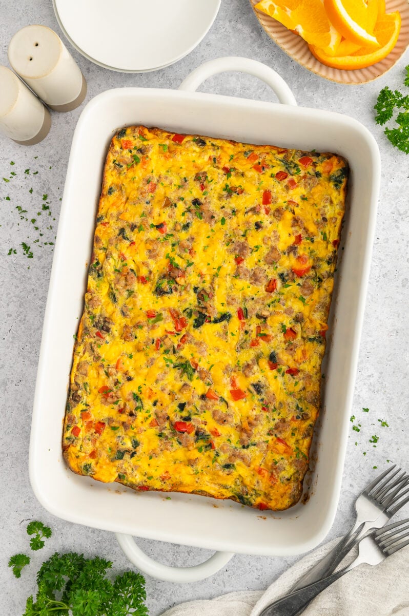 Sausage Egg bake in a white casserole baking dish.