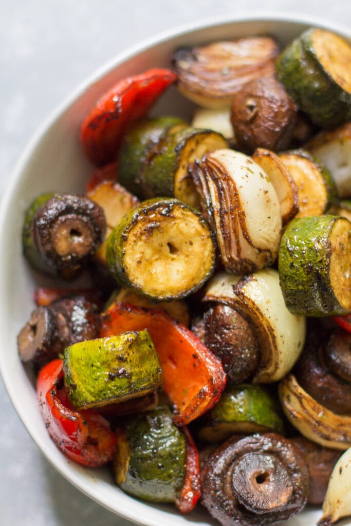 Vegetable Kebabs taken off the skewer in a white bowl.