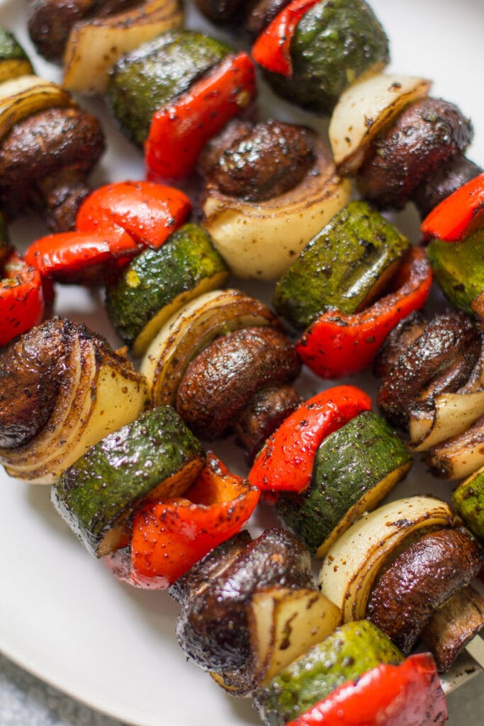 closeup photo of vegetable kebabs that just came off the grill