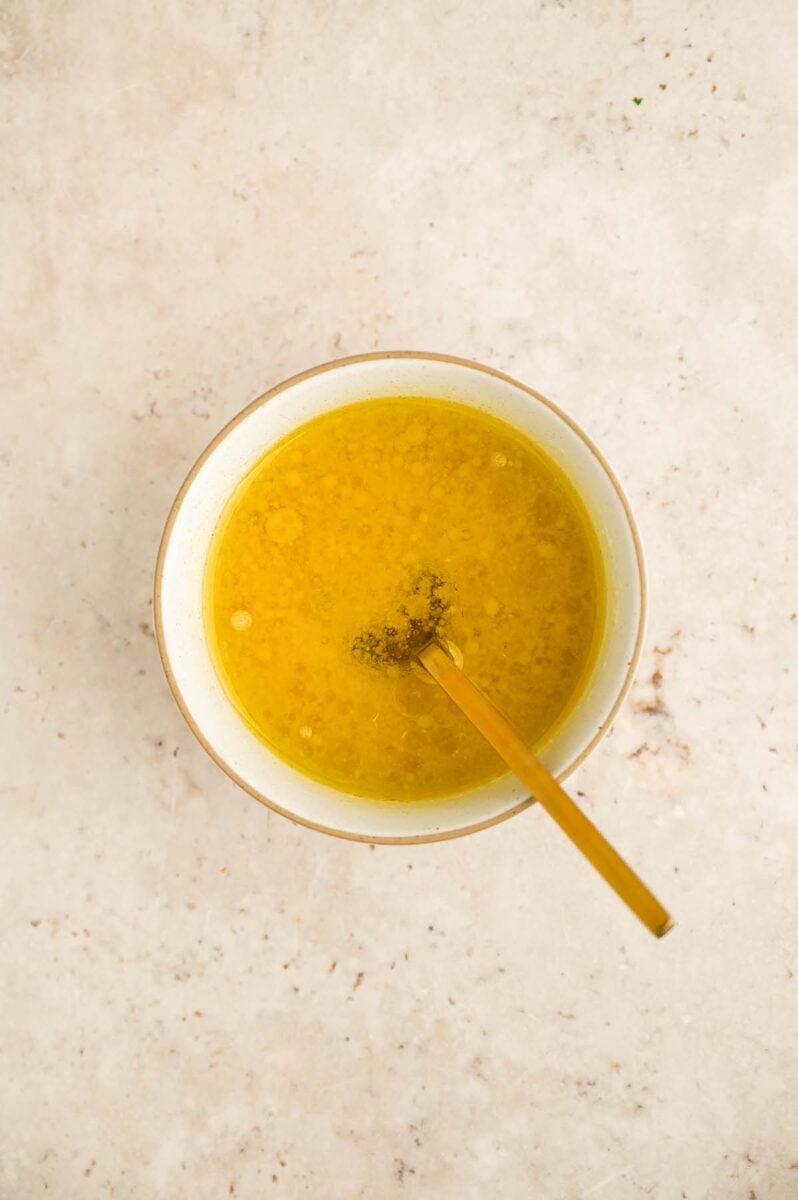 Easy farro salad dressing in a small bowl. 