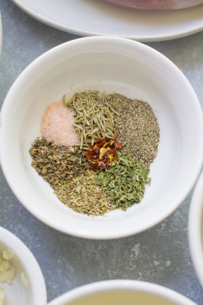 Close up of spices used for Italian Pork Tenderloin sheet pan dinner