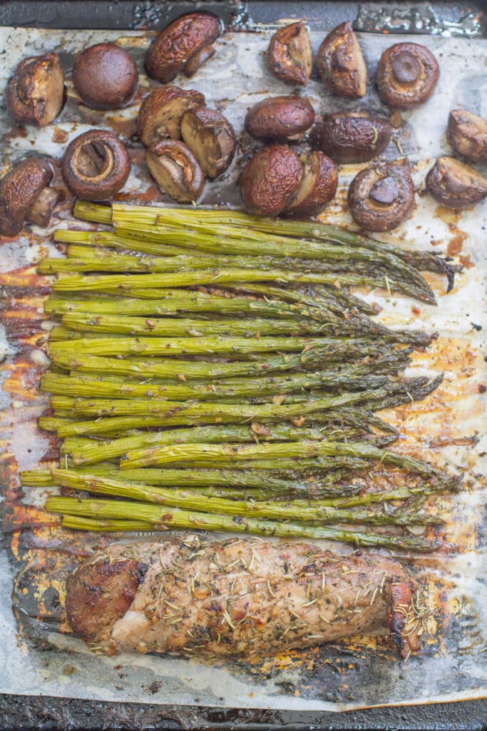 Italian Pork Tenderloin Sheet Pan Dinner on a baking sheet fresh out of the oven.