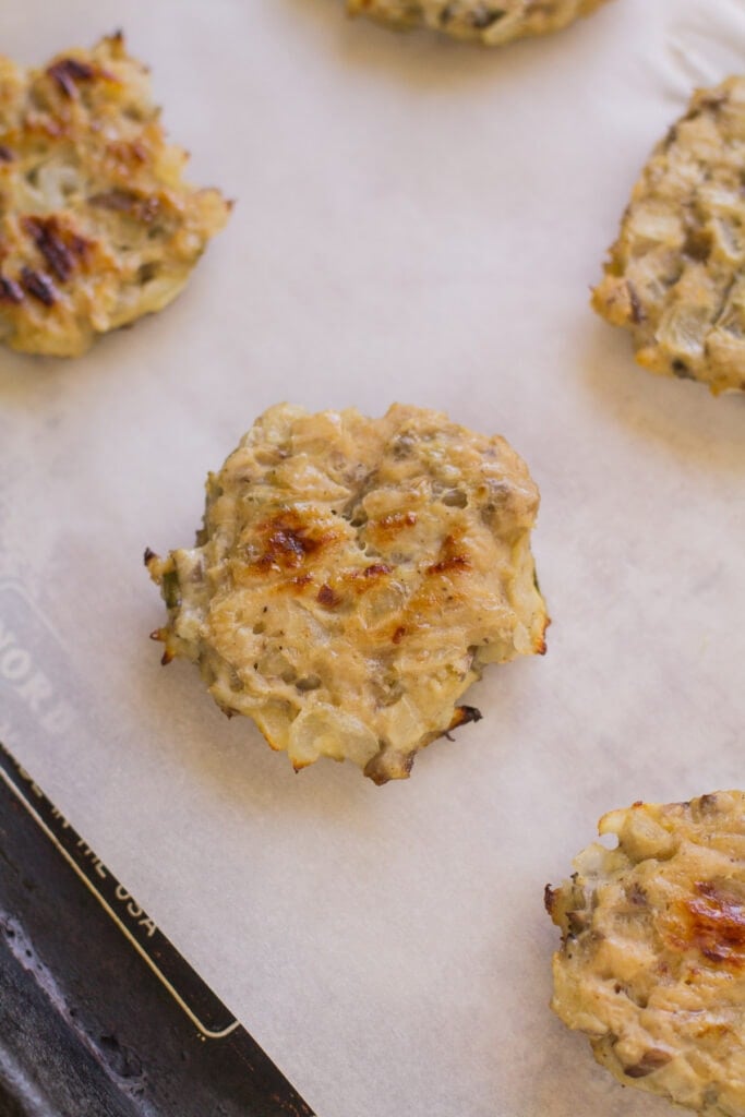 Healthy Breakfast Sausage on a parchment lined baking sheet.