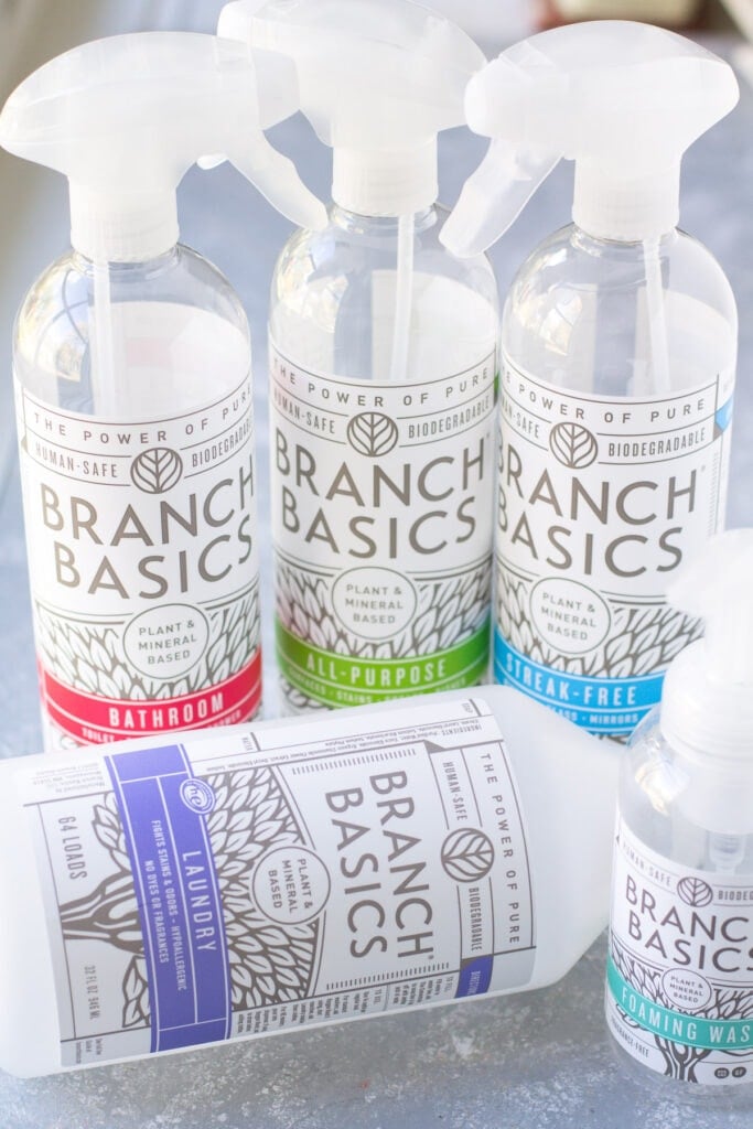 Branch Basics product bottles on a grey background