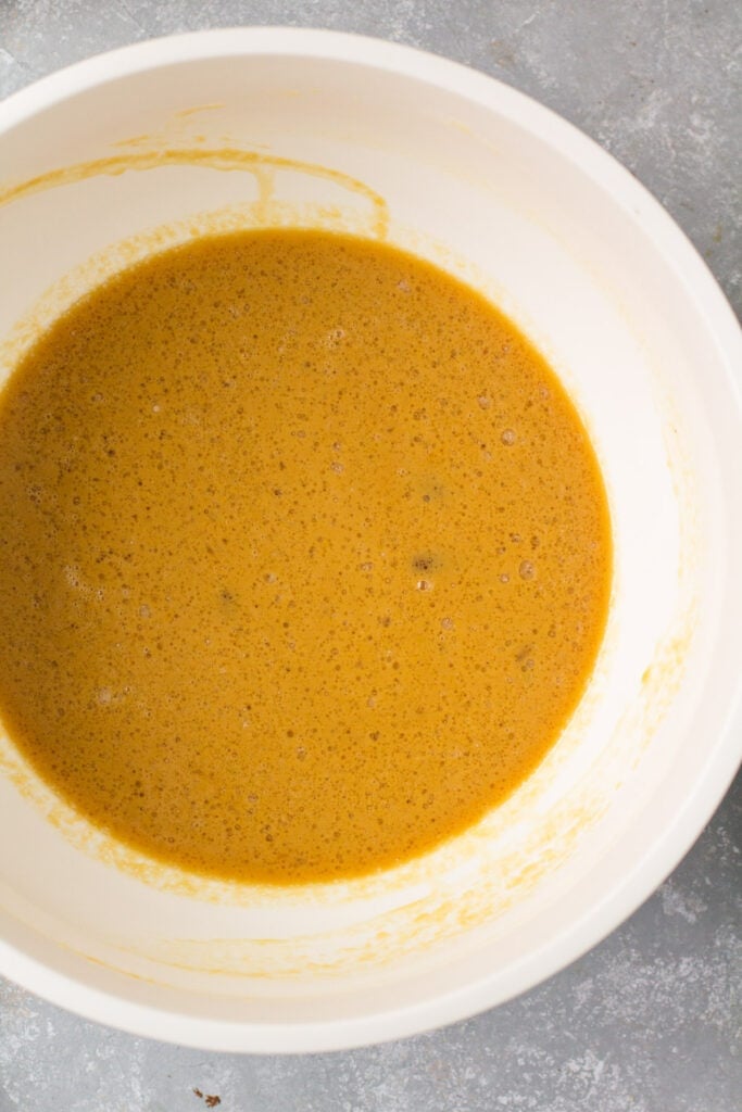 Wet ingredients for healthy gingerbread being mixed together in a bowl