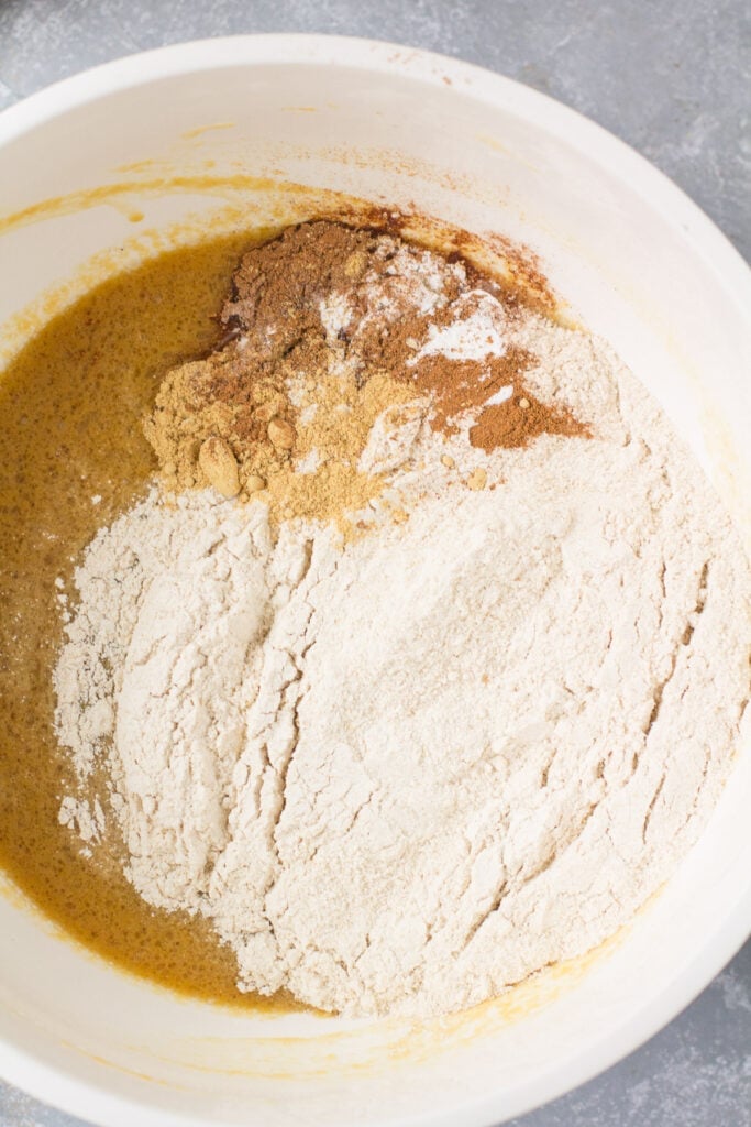 Dry ingredients being added to healthy gingerbread batter