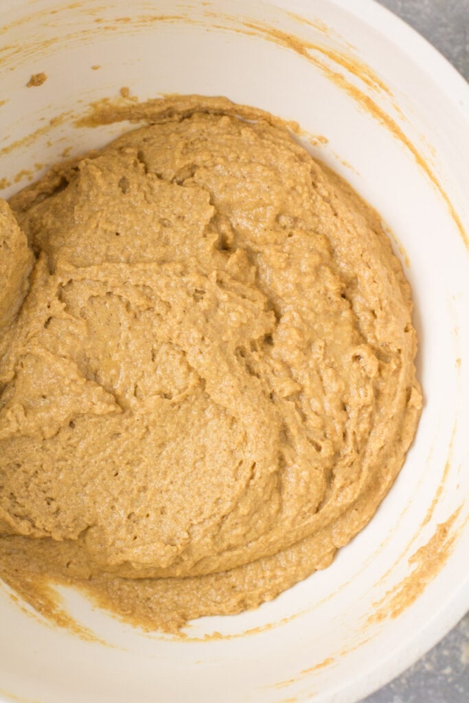 batter for healthy gingerbread loaf in a white bowl