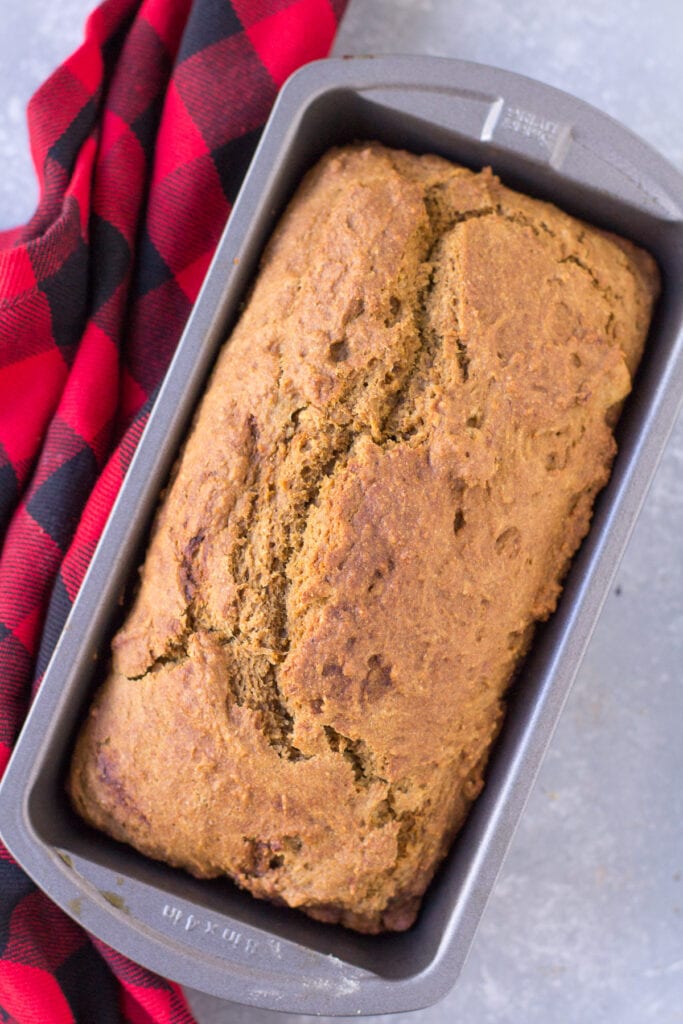A close up of healthy gingerbread loaf on a grey background