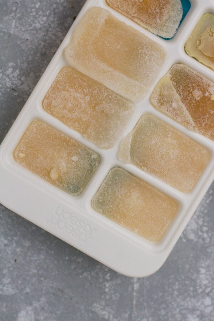 Chicken bone broth frozen in ice cube trays