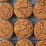 A close up of The BEST Crispy Gingersnap Cookies on a cooling rack