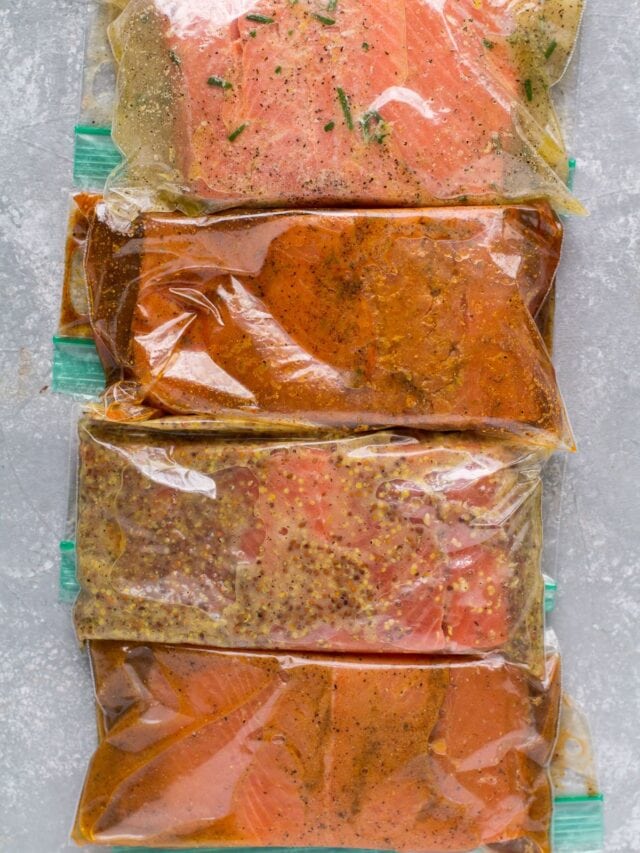4 pieces of salmon in plastic food storage bags with salmon marinade.