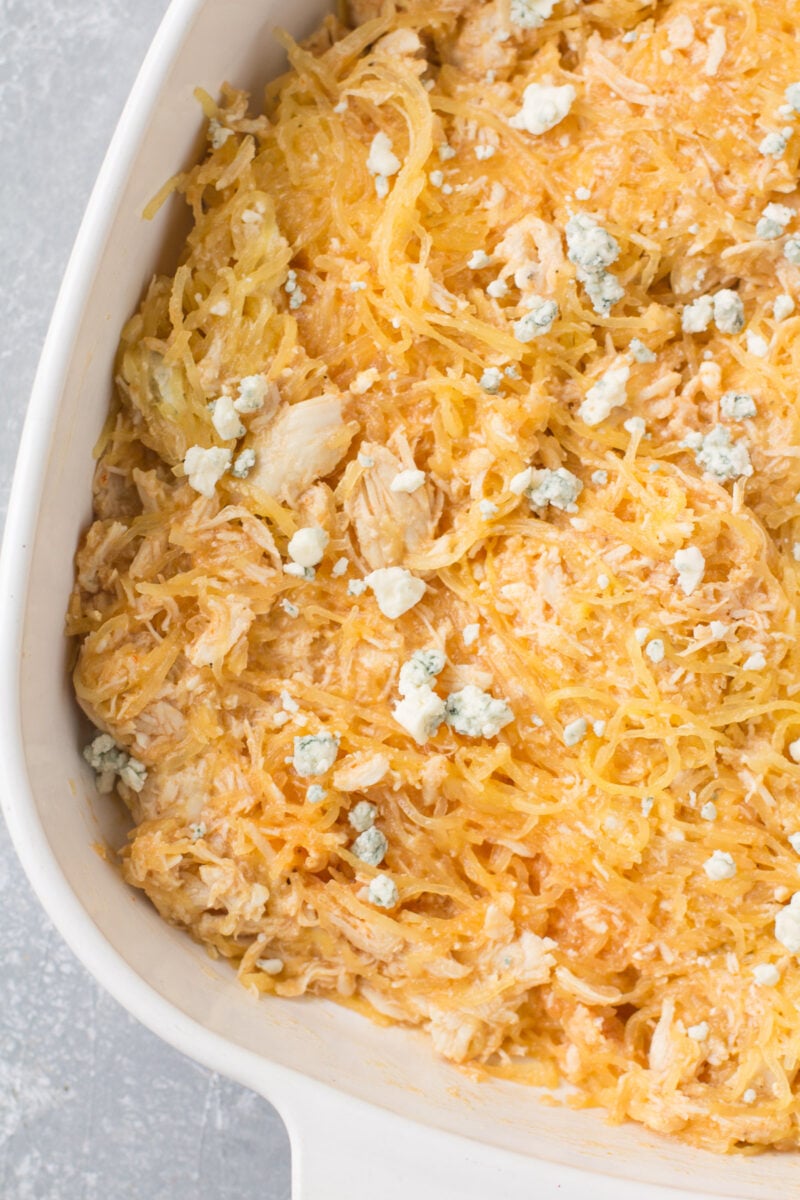 Uncooked Buffalo Chicken Spaghetti Squash Casserole in a baking dish.