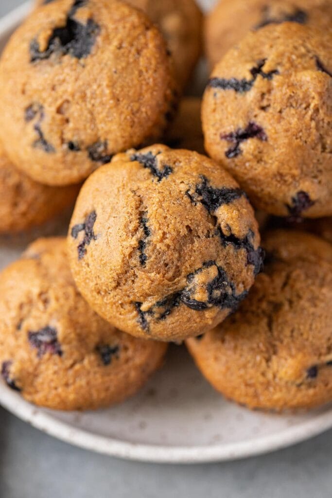A close up of blueberry muffins - the perfect healthy brunch recipe for a crowd.