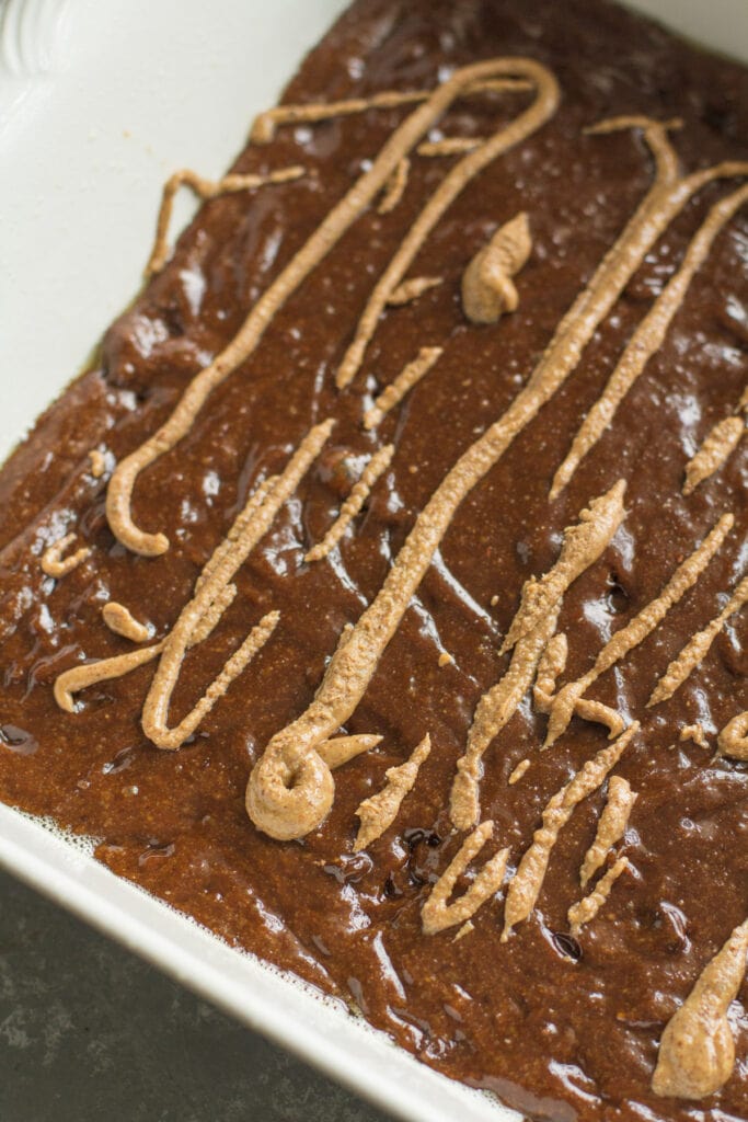 almond butter brownies in a pan before baking 