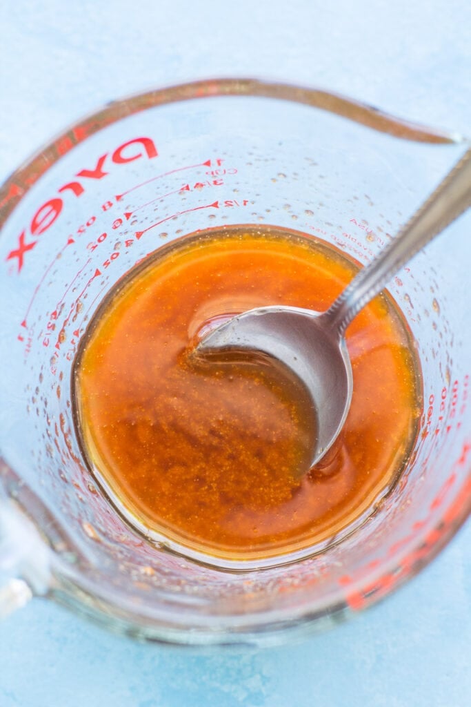 A close up of honey sriracha salmon glaze