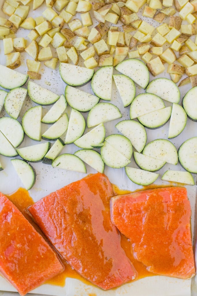 Honey Sriracha salmon Sheet pan dinner going into the oven