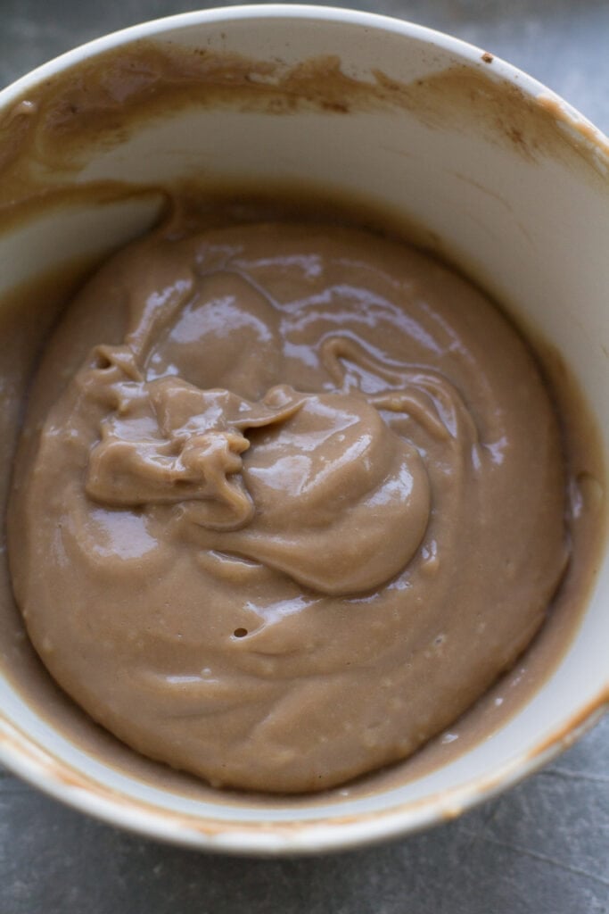 a close up of a small bowl of chocolate italian cream