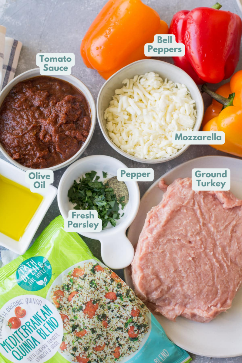 Ingredients for Quinoa Stuffed Peppers in a small white bowls on a grey background.