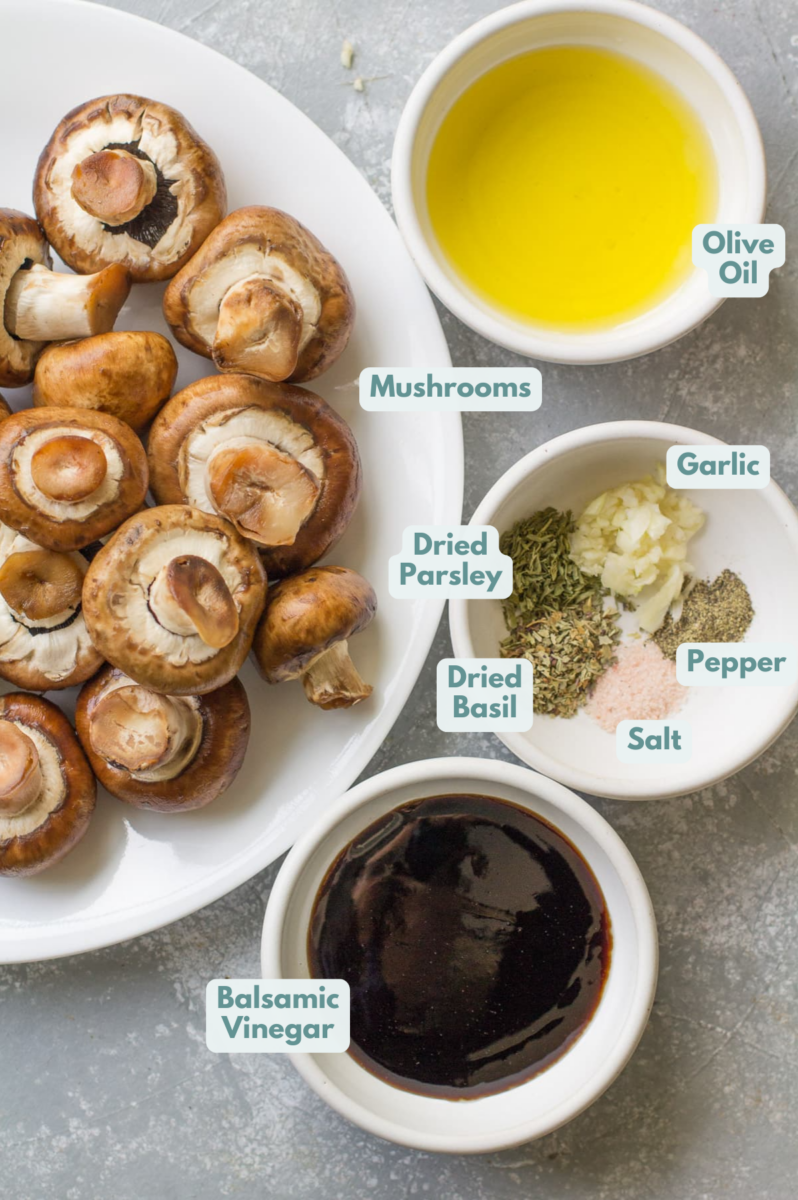Ingredients for Balsamic Mushrooms in small white bowls - mushrooms, olive oil, seasonings, balsamic vinegar.