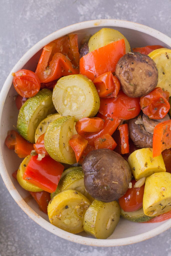 Easy Grilled Vegetables in a white bowl on a grey background.