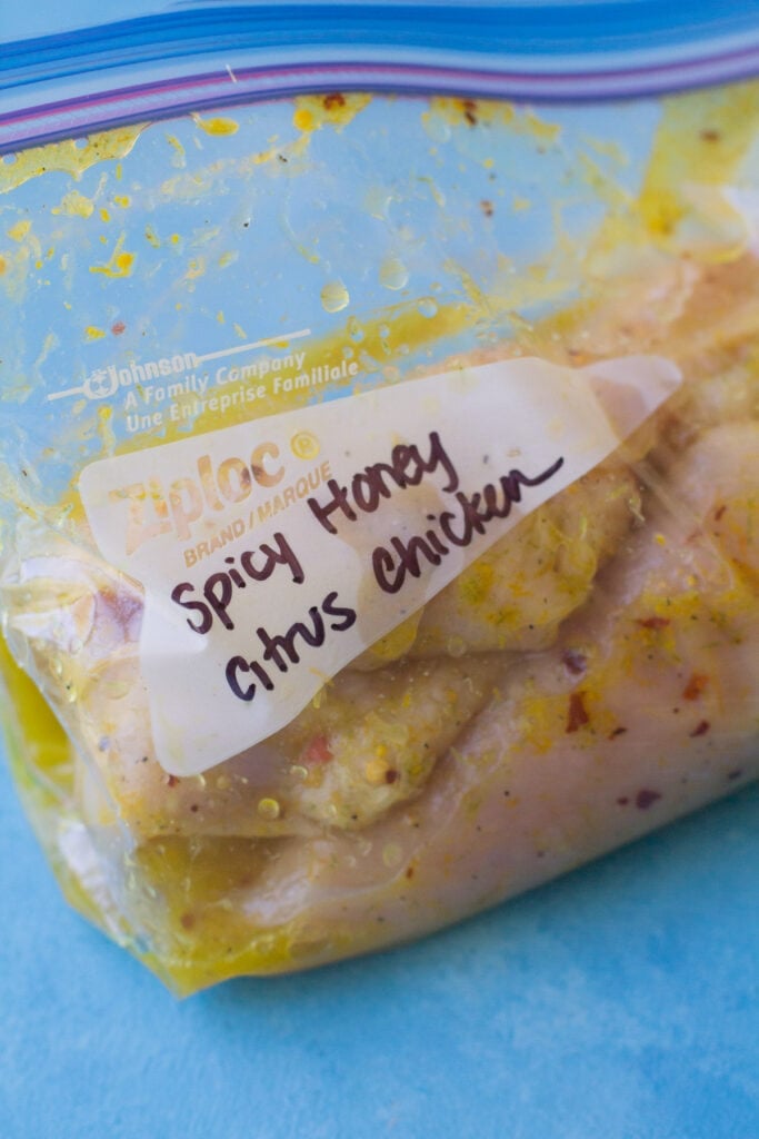 Spicy Honey Citrus Chicken marinating in a ziploc bag