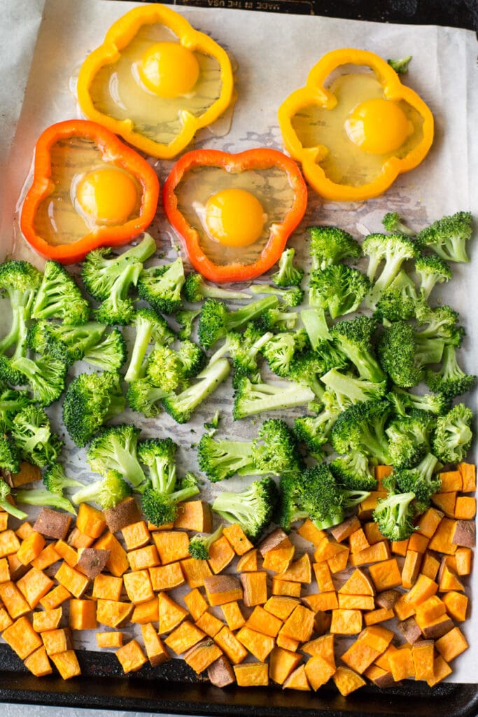 a close up of sheet pan breakfast being being cooked