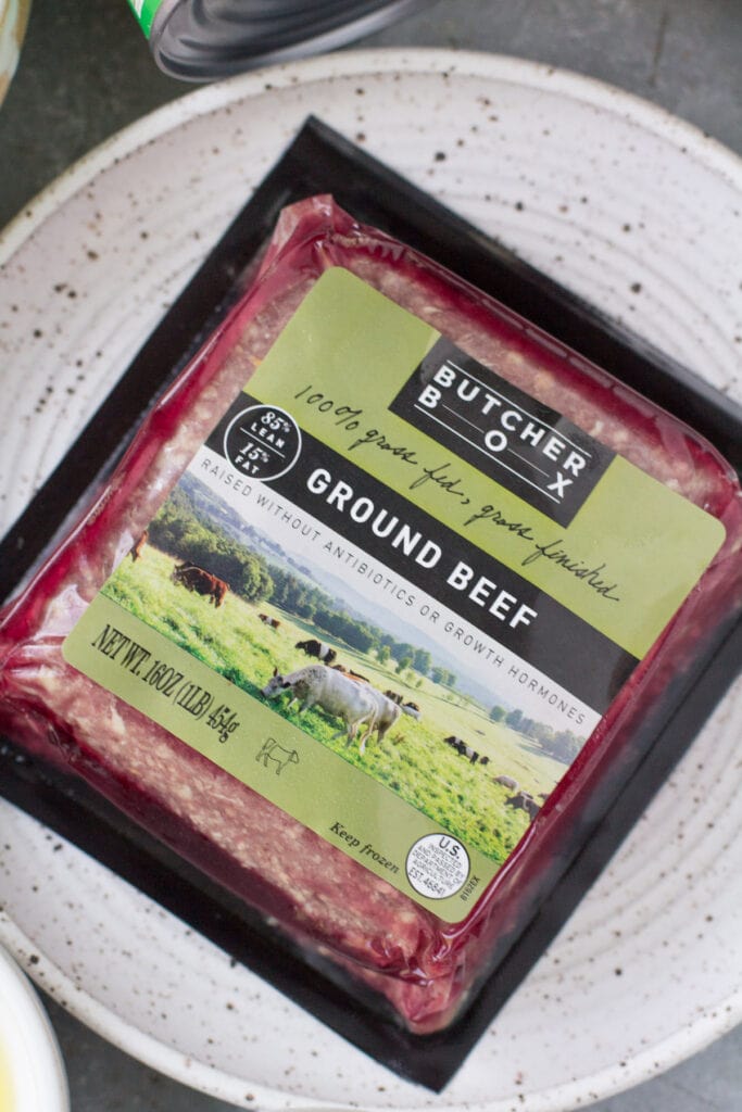 A close up of butcherbox ground beef on a white plate