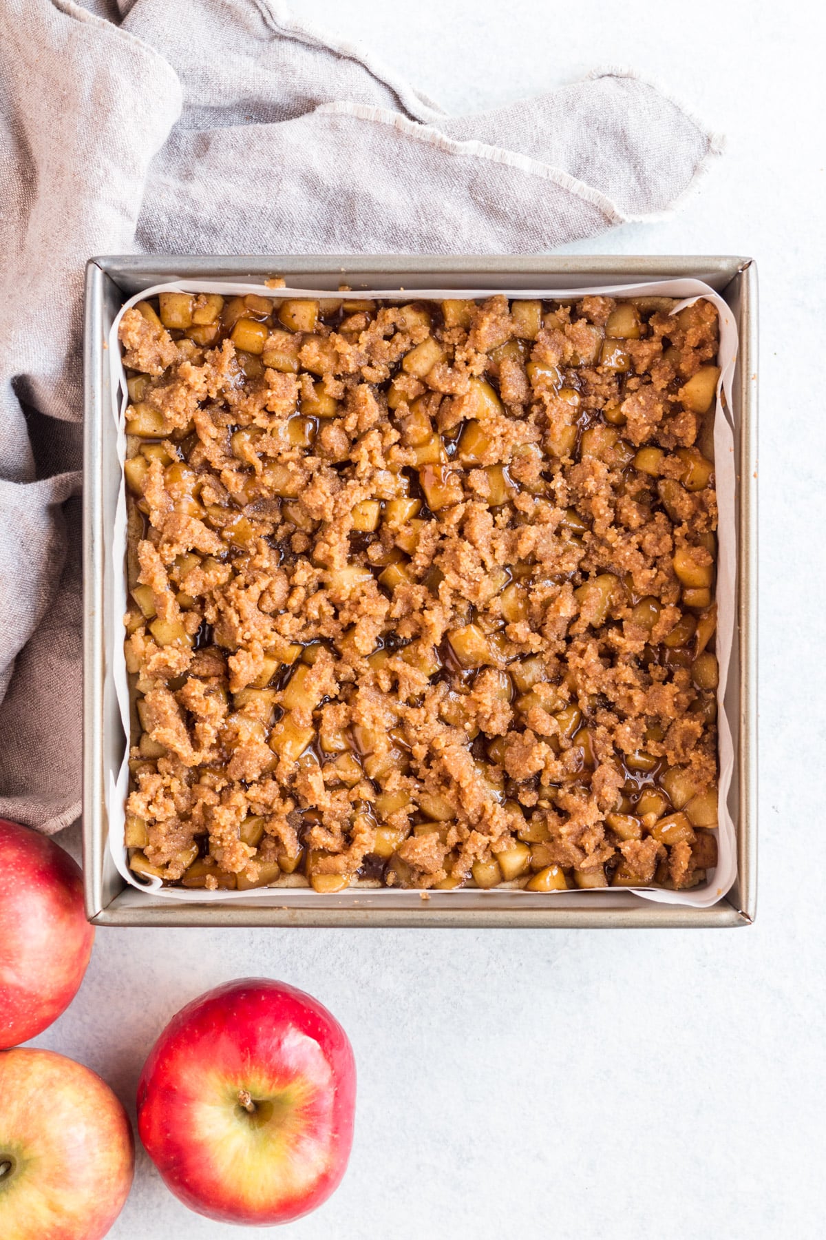 a close up of healthy apple pie bars fresh out of the oven