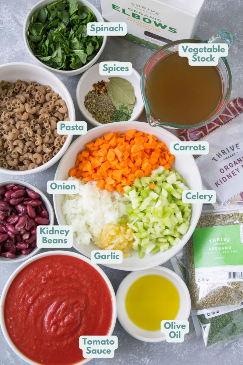 Ingredients for Easy Minestrone Soup in small white bowls.