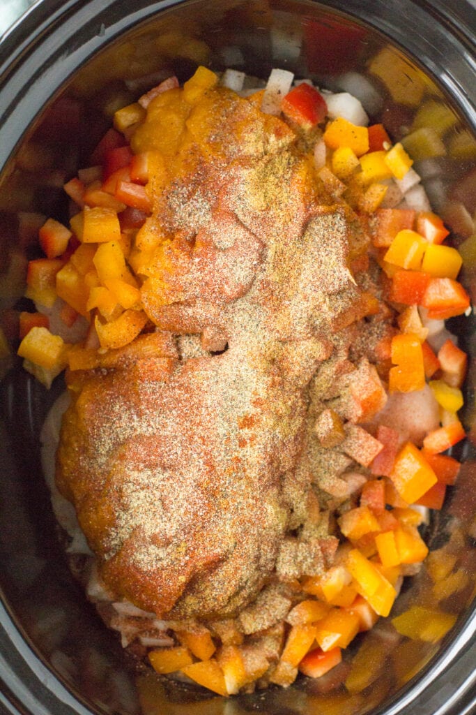 Pumpkin chicken chili in a crockpot before being cooked