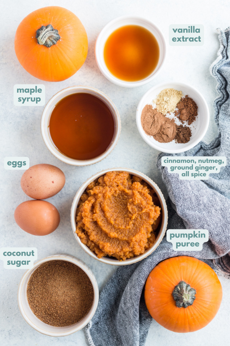 Ingredients for Healthy Pumpkin Pie Bars' filling in small white bowls ready to be baked