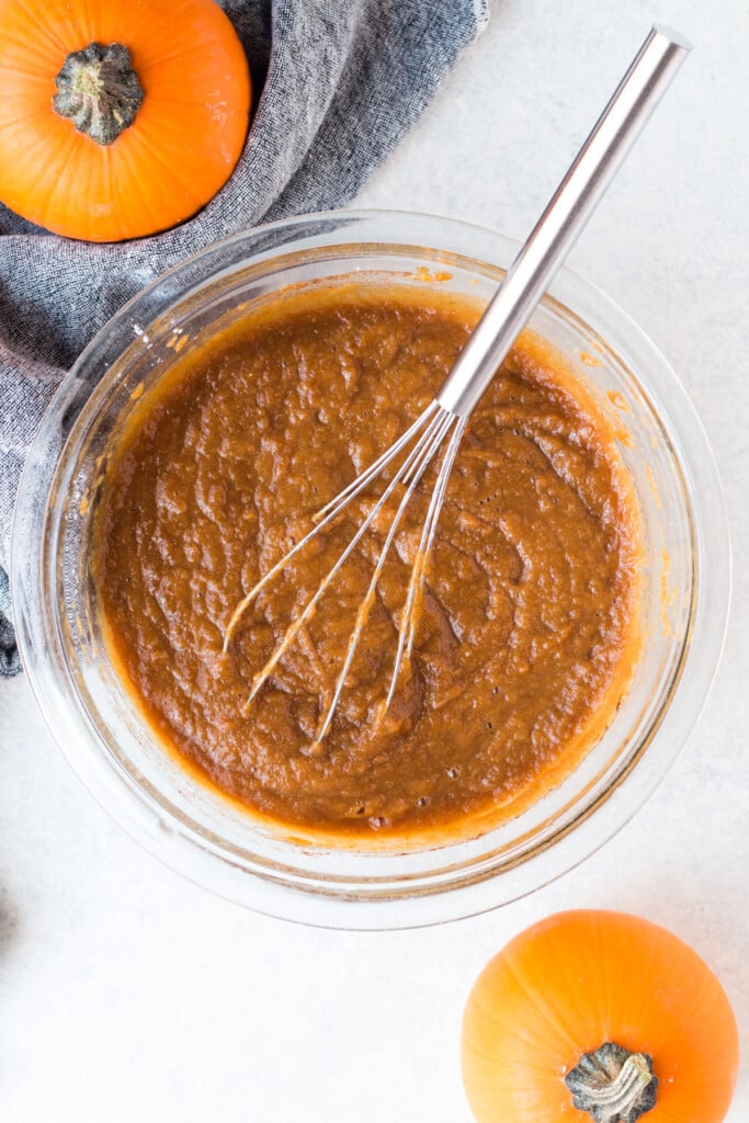 filling for pumpkin pie bars in a bowl being mixed together